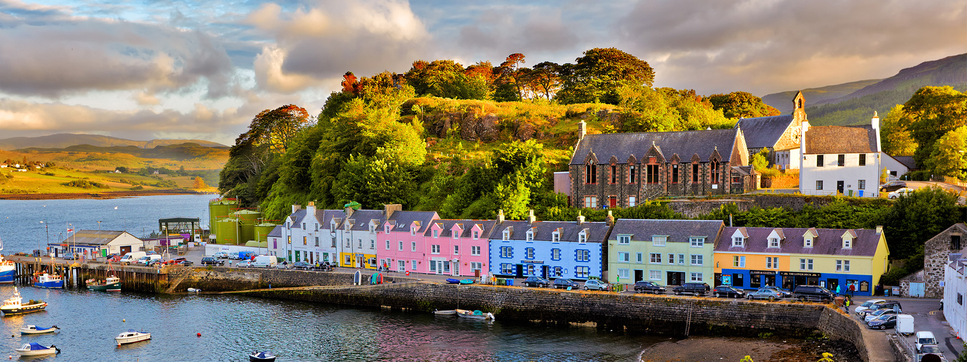 Bay in Portree, with church in background.